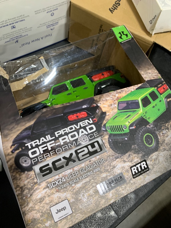 Photo 1 of Axial RC Truck SCX24 Jeep Gladiator 4 Wheel Drive Rock Crawler Brushed RTR Nothing Needed to Complete Ready-to-Run Green AXI00005V2T3, Remote Control Car, RC Car, RC Crawler