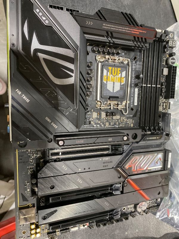 Photo 1 of ASUS ROG Strix Z790-E Gaming WiFi II LGA 1700(Intel 14th & 13th & 12th Gen)ATX gaming motherboard(DDR5,PCIe 5.0,2.5 Gb LAN,5XM.2 slots,PCIe 5.0 x16,WiFi 7 front-panel connector with PD 3.0 up to 30W.