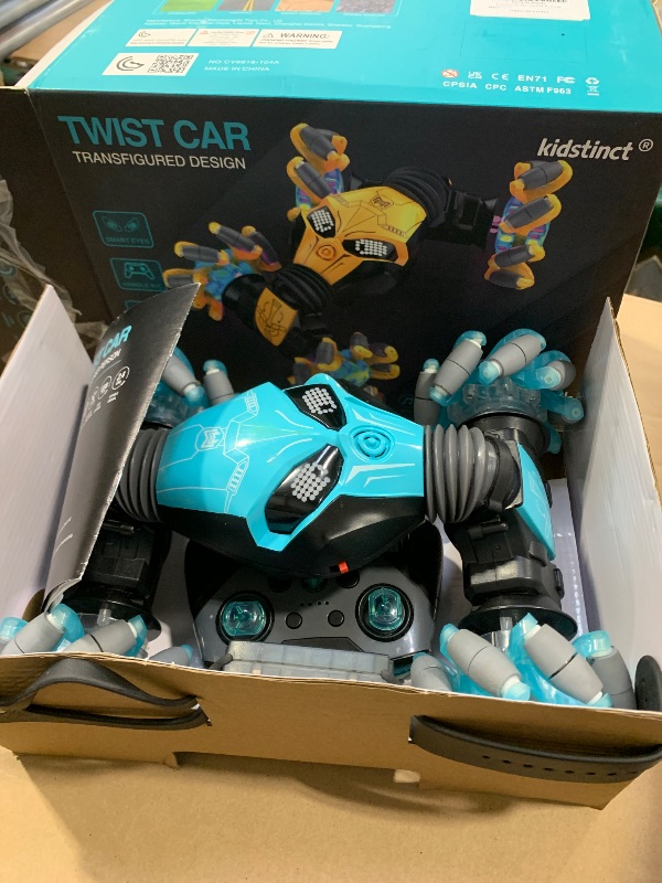 Photo 1 of 1:12 Gesture Sensing RC Stunt Car, 4WD Hand Controlled Remote Control Twist Cars with Light & Music, 360° Rotate Transform Drift, Gifts for 6-8-12 Kids Age 6 7 8 9 10 11 12 Yrs Old?(Bule)