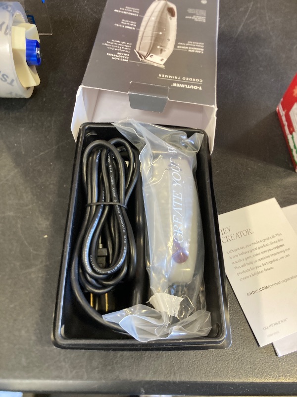 Photo 1 of Andis 04780 Professional T-Outliner Beard & Hair Trimmer for Men with Carbon Steel T-Blade, Bump Free Technology – Corded Electric Beard Trimmer, GTO, Grey