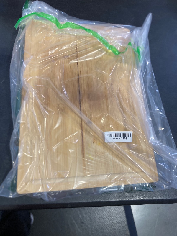 Photo 1 of Bamboo Cutting Board for Kitchen, 18" Large Wood Charcuterie Cheese Board, Wooden Chopping Block with Side Handles and Juice Grooves