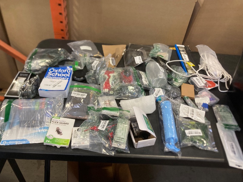 Photo 1 of 40 piece bag lot new and used items no  returns 