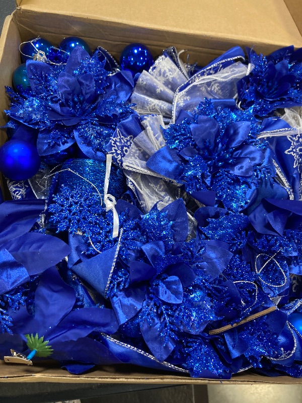 Photo 1 of Knitgrip 62 Pcs Christmas Tree Decoration Set with Large Christmas Tree Bow Topper Glitter Poinsettia Flowers Plastic Xmas Snowflake Ribbon Bow Ball and Ribbon for Wreaths Holiday Ornament(Blue)