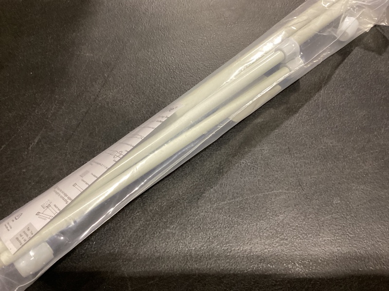 Photo 1 of KXLife 2Pcs Spring Tension Curtain Rod, 28 to 40 Inch Adjustable Small Tension Rods No Drill, White Spring Loaded Curtain Tension Rod for Window