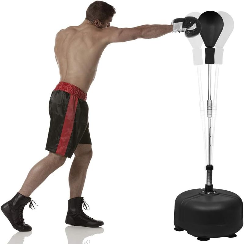 Photo 1 of Punching Bag with Stand for Adults & Kids, Height Adjustable- Freestanding Punch Ball Boxing Speed Reflex Bag - Great for Training, Stress Relief & Fitness