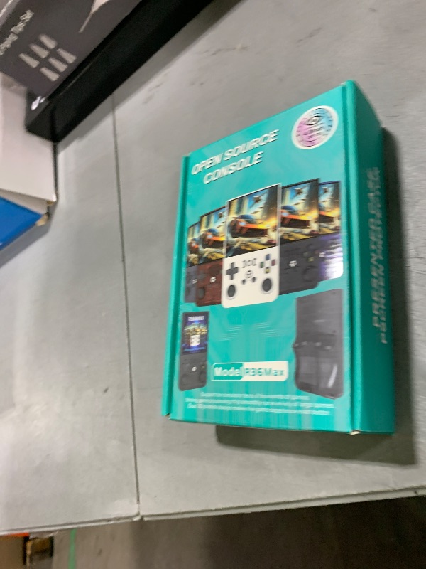 Photo 1 of R36 Max Retro Gaming Console, Retro Handheld Console 4.0'' Screen Linux System, 64G TF Card, 4000mAh Rechargeable Portable Pocket Arcade, Transparent Blue