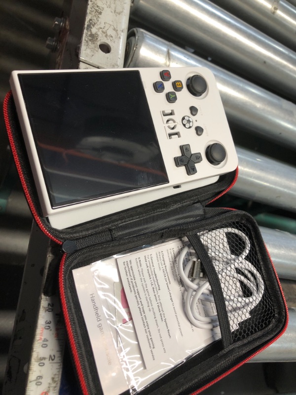 Photo 1 of ?R36MAX 4000mAh Portable Rechargeable Handheld Retro Game Console,Comfort Non-Slip Handheld Standing Retro Game Console with 64G TF Car,4.0-inch Screen,for Office,Purple Gray
