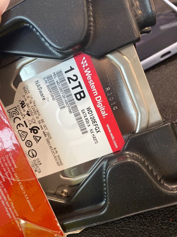 Photo 1 of **UNTESTED**
Western Digital 12TB WD Red Plus NAS Internal Hard Drive HDD - 7200 RPM, SATA 6 GB/s, CMR, 512 MB Cache, 3.5" - WD120EFGX