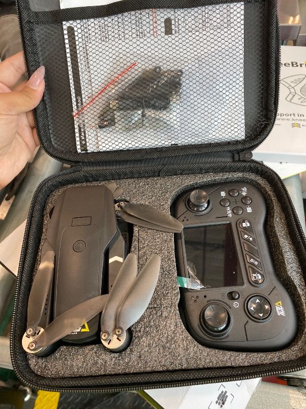 Photo 1 of **UNTESTED**
Toladrone TD31LCD RC Drone with LCD Screen, Foldable Drone for Beginners Digital Image Real-time Transmission, Fine Tuning Function Brushless Motor Drones for Adults