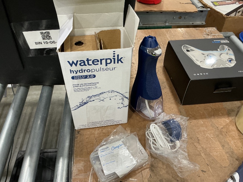Photo 1 of Waterpik Cordless Advanced 2.0 Water Flosser For Teeth, Gums, Braces, Dental Care With Travel Bag and 4 Tips, ADA Accepted, Rechargeable, Portable, and Waterproof, Blue WP-583, Packaging May Vary