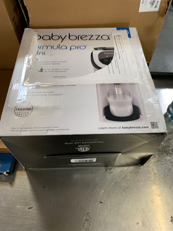 Photo 1 of Baby Brezza Formula Pro Mini Baby Formula Mixer Machine Fits Small Spaces and is Portable for Travel– Bottle Makers Makes The Perfect Bottle for Your Infant On The Go, White
