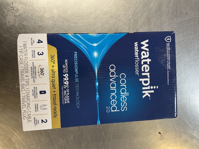Photo 1 of Waterpik Cordless Advanced 2.0 Water Flosser For Teeth, Gums, Braces, Dental Care With Travel Bag and 4 Tips, ADA Accepted, Rechargeable, Portable, and Waterproof, White WP-580, Packaging May Vary