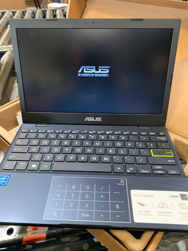 Photo 1 of ASUS Notebook E210 11.6” Ultra Thin, Intel Celeron N4020 Processor, 4GB RAM, 64GB eMMC Storage, Windows 10 Home in S Mode with One Year of Office 365 Personal, E210MA-DB02,Star Black