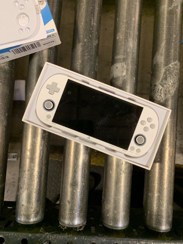 Photo 1 of Trimui Smart Pro Game Console 4.96-Inches 720x1280 IPS Screen Built-in 64G TF Card Video Gaming Consoles 5000mAh Lithium Battery Supports Multiple Simulators Casual Game Console-White