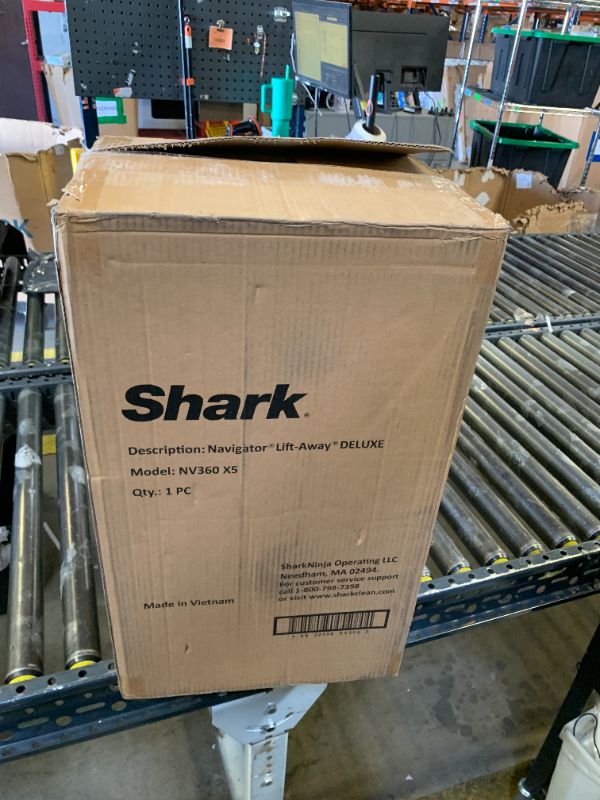 Photo 1 of Shark Upright Vacuum, Navigator Lift-Away Deluxe with Large Dust Cup Capacity, HEPA Filter, Swivel Steering, Upholstery Tool & Crevice Tool, Blue, NV360
