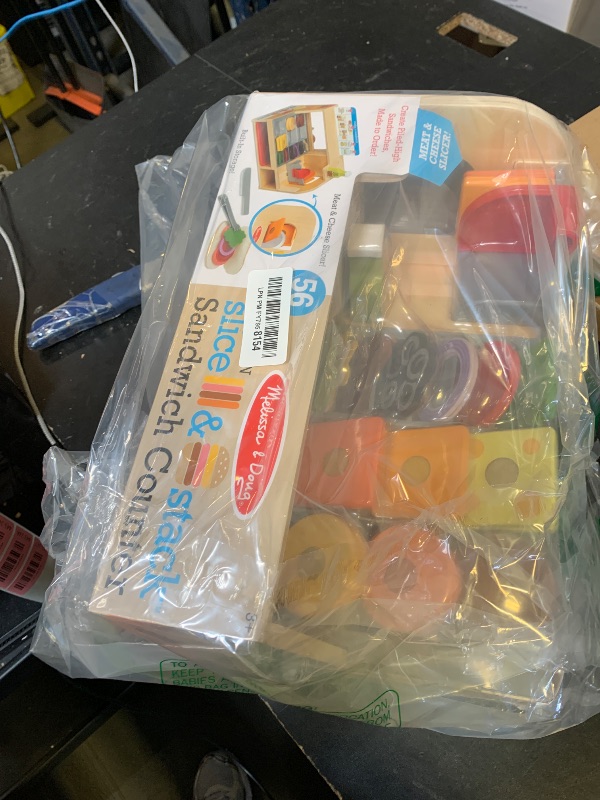 Photo 1 of Melissa & Doug Slice-Stack-Serve, Wooden Sandwich Counter Pretend Play Store with Play Food Toys, Play Money & Deli Slicer, Preschool Toys for Kids 3+