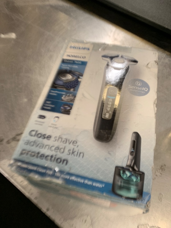 Photo 1 of Philips Norelco Shaver 7600, Rechargeable Wet & Dry Electric Shaver with SenseIQ Technology, Quick Clean Pod, Travel Case & Pop-up Trimmer, S7886/84