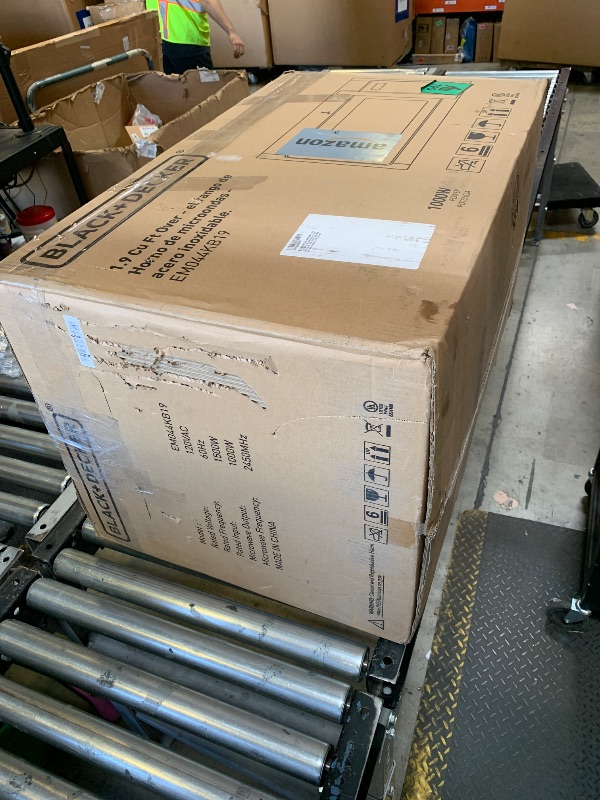 Photo 1 of BLACK+DECKER EM044KB19 Over The Range Microwave Oven with One Touch, 1000 Watts, 400 CFM and Auto Cooking, OTR 1.9 Cu.ft