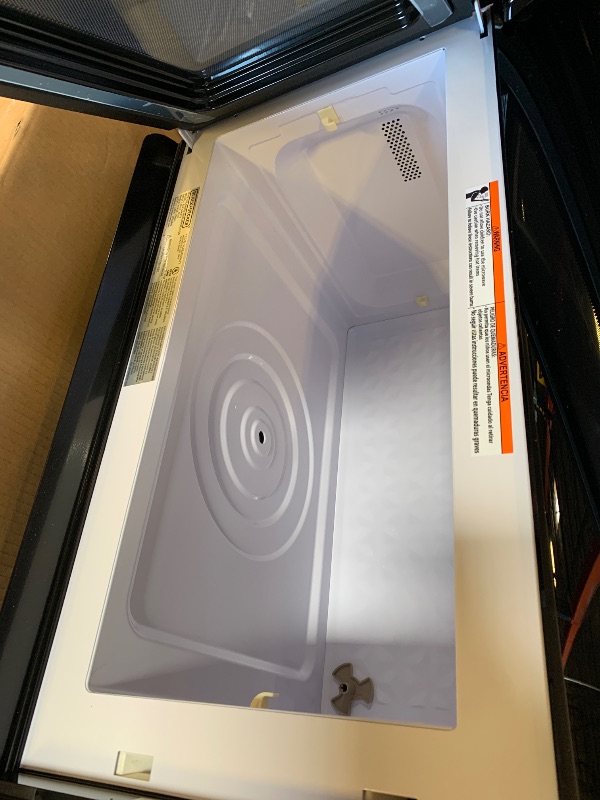 Photo 1 of BLACK+DECKER EM044KB19 Over The Range Microwave Oven with One Touch, 1000 Watts, 400 CFM and Auto Cooking, OTR 1.9 Cu.ft