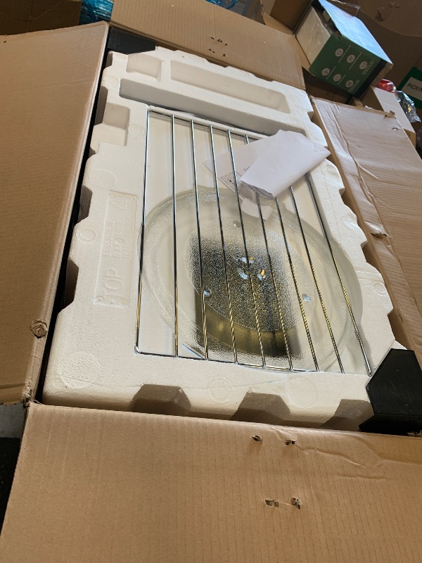 Photo 1 of BLACK+DECKER EM044KB19 Over The Range Microwave Oven with One Touch, 1000 Watts, 400 CFM and Auto Cooking, OTR 1.9 Cu.ft