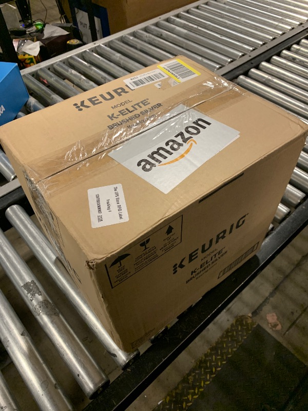 Photo 1 of Keurig K-Elite Single Serve K-Cup Pod Coffee Maker, with Strength and Temperature Control, Iced Coffee Capability, 8 to 12oz Brew Size, Programmable, Brushed Silver