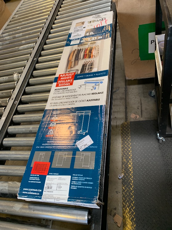 Photo 1 of ClosetMaid ShelfTrack Wire Closet Organizer System, Adjustable from 2 to 4 Ft., With Shelves, Clothes Rods, Hardware, Durable Steel, White