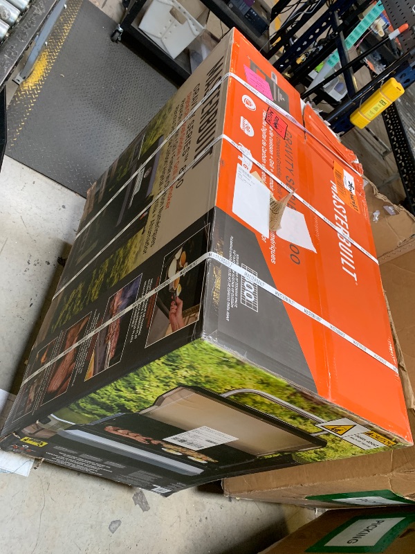 Photo 1 of Masterbuilt® Gravity Series® 800 Smoker Grill - Charcoal Grill plus Griddle Insert, Digital Control, App Connectivity, 800 Cooking Square Inches in Black, Model MB20040221 (slight damage dent) (sealed packaging)