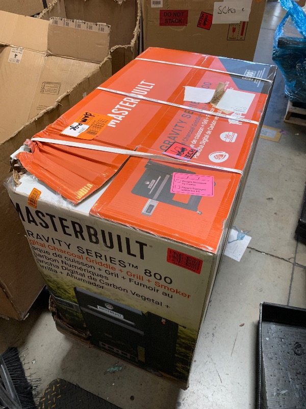 Photo 1 of Masterbuilt® Gravity Series® 800 Smoker Grill - Charcoal Grill plus Griddle Insert, Digital Control, App Connectivity, 800 Cooking Square Inches in Black, Model MB20040221 (slight damage dent) (sealed packaging)