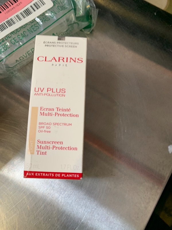 Photo 1 of Clarins UV Plus Anti-Pollution, Broad Spectrum SPF 50 Tinted Face Sunscreen | Sheer Finish | Lightweight and Oil-Free | Triple Protection From UVA/UVB Rays, Free Radicals and Pollutants | Shade Light