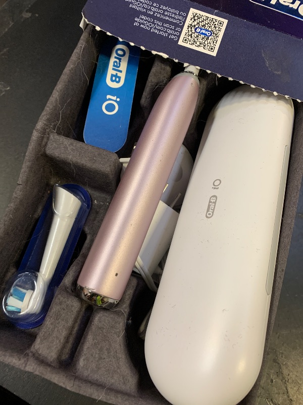 Photo 1 of Oral-B Rechargeable Electric Toothbrush, iO9 Genius, 7 Cleaning Modes, Interactive Display, Charging Travel Case, Visible Pressure Sensor, 4 Brush Heads, Rose Quartz