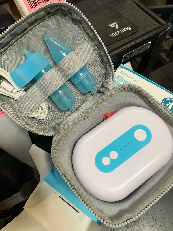 Photo 1 of Frida Baby Electric NoseFrida Pro Nasal Aspirator for Baby, Hospital Grade Suction, Nose Sucker for Baby & Toddler, Nasal Aspirator for Congestion Relief, 5 Suction Levels, 2 Tips, Cordless with Case