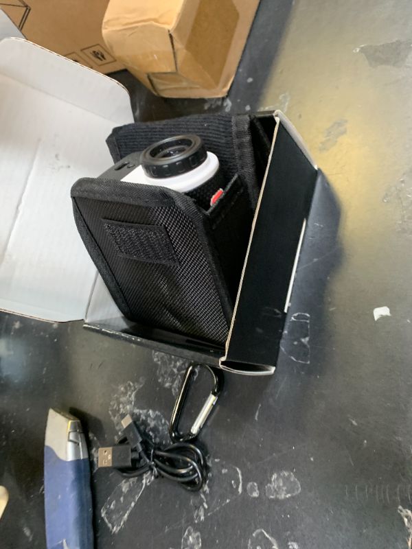 Photo 1 of Leexox Golf Rangefinder with Slope Switch, Rechargeable Range Finder with Flag Lock Vibration, 7X Magnification Golf Rangefinder 1200 Yards, Portable with Magnetic Stripe – Tournament Legal, White