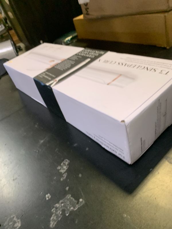 Photo 1 of T3 SinglePass Curl X Extra-Long Barrel Curling Iron with 9 Heat Settings and Ceramic Barrel for Fast Styling and Lasting Results on All Hair Types