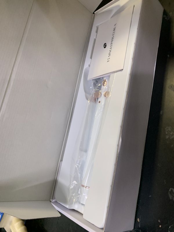 Photo 1 of T3 SinglePass Curl X Extra-Long Barrel Curling Iron with 9 Heat Settings and Ceramic Barrel for Fast Styling and Lasting Results on All Hair Types