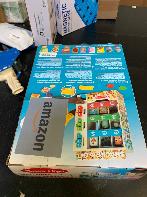 Photo 1 of Melissa & Doug Sort-Stock-Select Wooden Vending Machine Toy with Play Food, Mini Vending Machine Toys & Play Money, Preschool Toys for Kids Ages 3+