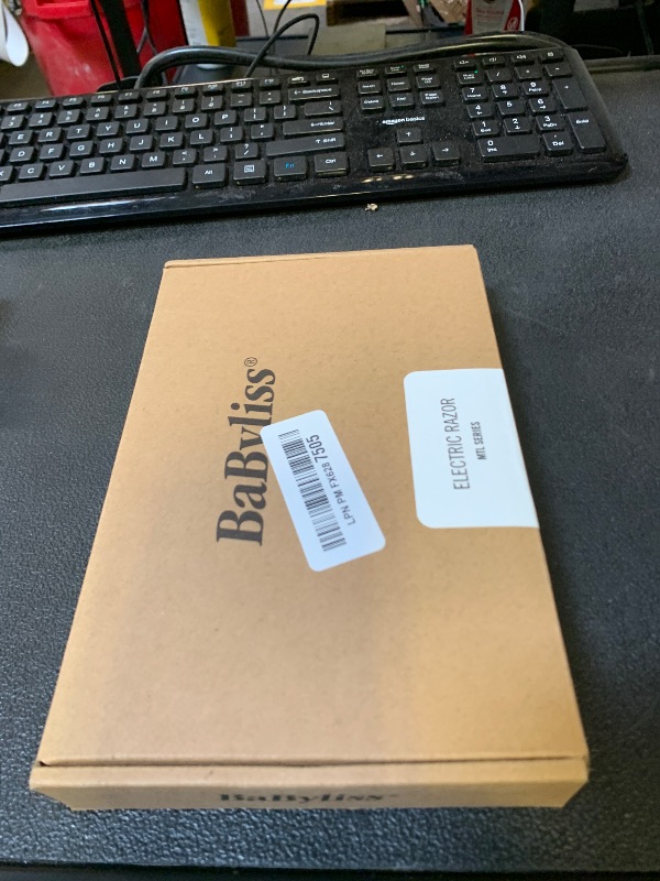 Photo 1 of BaByliss MTL Series Electric Razor Including 4 Comb attachments, Storage Bag, Charging Stand and Cable