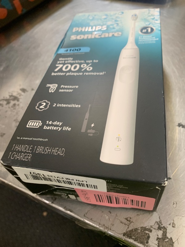 Photo 1 of Philips Sonicare 4100 Rechargeable Electric Toothbrush, Advanced Plaque Removal, Pressure Sensor, Includes Brush Head Case, White BD5002AZ