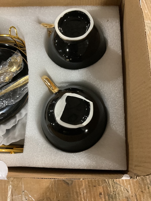 Photo 1 of * one of the cups bottom is broken *
DUJUST Tea Cups and Saucers Set of 4 (7.4oz), Luxury Tea Cup Set with Golden Trim, Black Coffee Cups with Metal Stand, British Porcelain Tea Party Set - Black