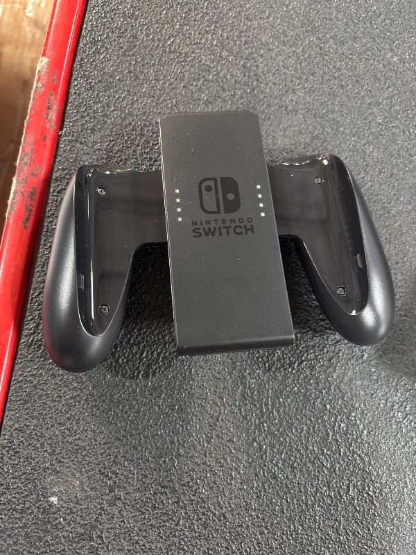 Photo 1 of (used)(incomplete) Nintendo Switch™ with Neon Blue and Neon Red Joy Con™