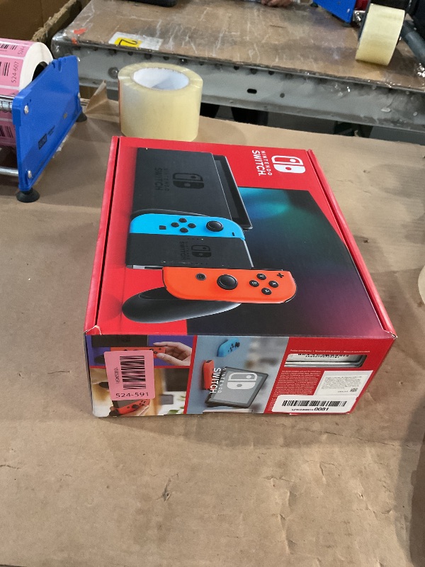 Photo 1 of (used)(incomplete) Nintendo Switch™ with Neon Blue and Neon Red Joy Con™