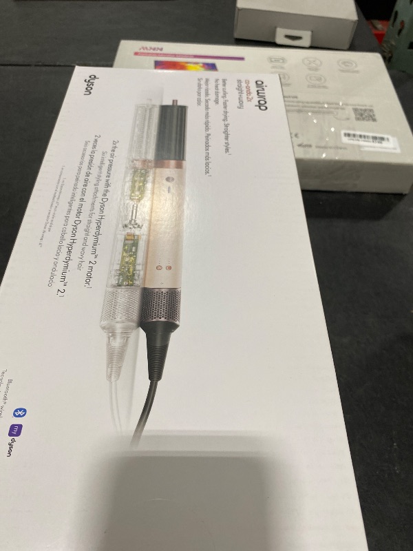 Photo 1 of Dyson Airwrap Co-anda2x™ Multi-Styler and Dryer Straight+Wavy in Ceramic Pink