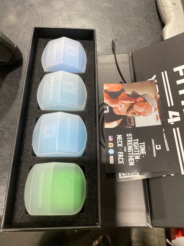 Photo 1 of Jawzrsize Athletic Bundle Jaw Enhancer - Jaw, Face, and Neck Exerciser, Helps Reduce Stress and Cravings - Facial Exercise (Pop N Go & Custom Fit (Beg., Adv., & Elite), Green & Blue)