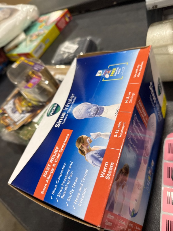 Photo 1 of Vicks Sinus Inhaler, New & Improved Non-Medicated Steam Inhaler for Sinus Relief, Allergies, Congestion & Colds, Vocal Steamer, Soothes Nasal & Throat Passages, Works with VapoPads (1 Included)