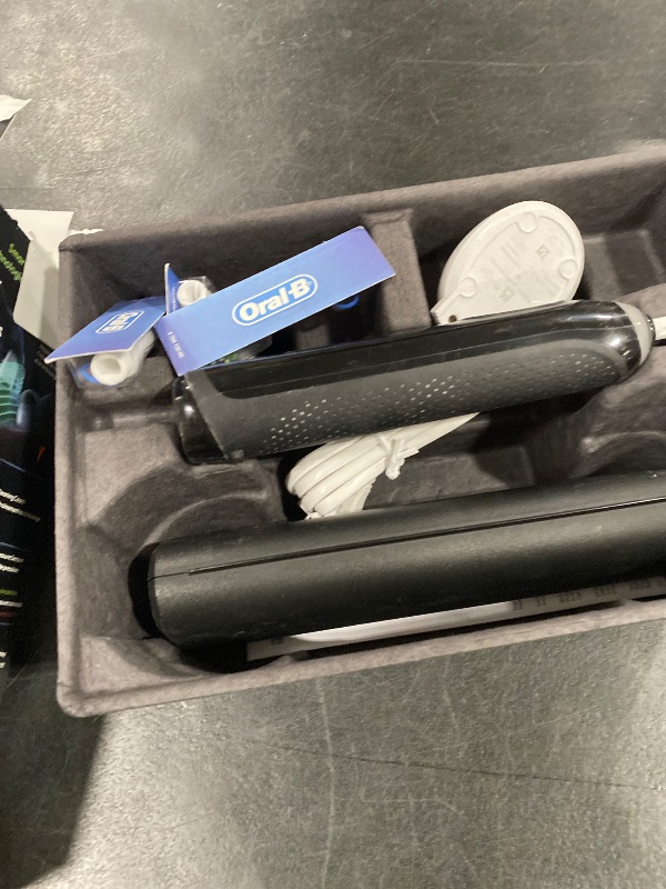 Photo 1 of Oral-B iO Series 9 Limited Rechargeable Black Electric Toothbrush with (2) Ultimate Clean and (1) Gentle Care Replacement Brush Heads, Black, Travel Case and Charger