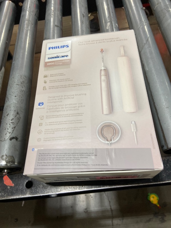 Photo 1 of Philips Sonicare DiamondClean 9900 Prestige Electric Toothbrush - with SenseIQ Technology and Advanced AI App, 5 Brushing Modes, 3 Intensity Levels, Charging Travel Case, Champagne, HX9990/11