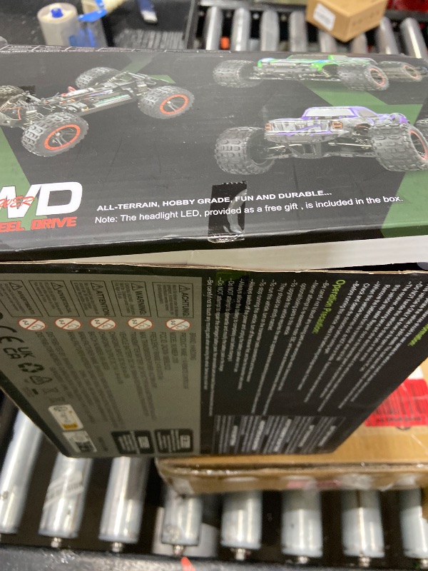 Photo 1 of HAIBOXING 1:14 Scale RC Truck, 4WD Off-Road RC Car, Hobby Remote Control Car, 2.4GHz Electric Vehicle Up to 39km/h, IPX4 Waterproof, 2 Rechargeable Batteries + 2 Interchangeable Shells