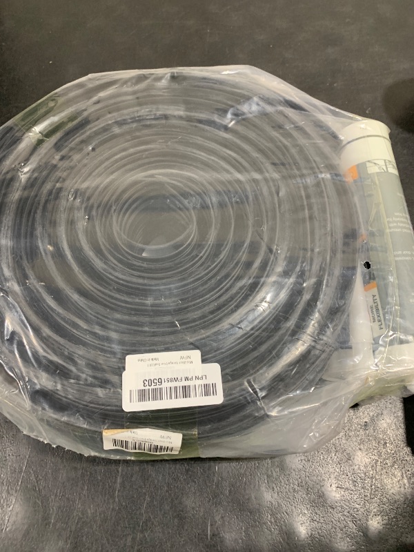 Photo 1 of Jin&Bao Universal Garage Door Threshold Seal Strip 20FT Kit, Bottom Waterproof Rubber Weather Stripping Replacement?Black, 2 Adhesive?