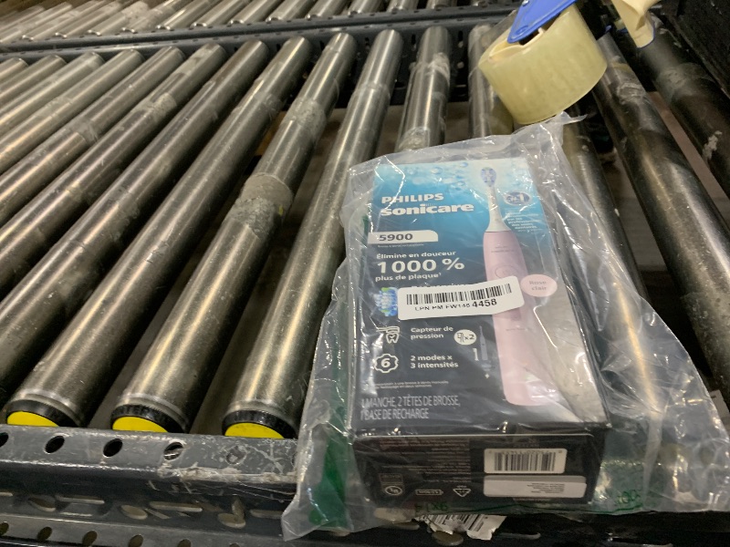 Photo 1 of Philips Sonicare 5900 Series Electric Toothbrush - Next-Generation Sonicare Technology, Pressure Sensor, 6 Brushing Settings, SmarTimer, BrushPacer, 21-Day Runtime, Light Pink, Model HX7132/02