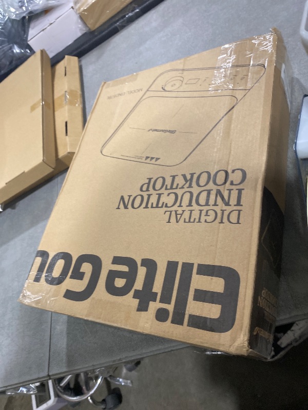 Photo 1 of Elite Gourmet EIND57BL SlimStore™ Induction Cooktop, Touch Controls, Ultra Thin 2" Profile, 10 Power Levels, Temps 140°F to 465°F, Fast Heat Up, Blue