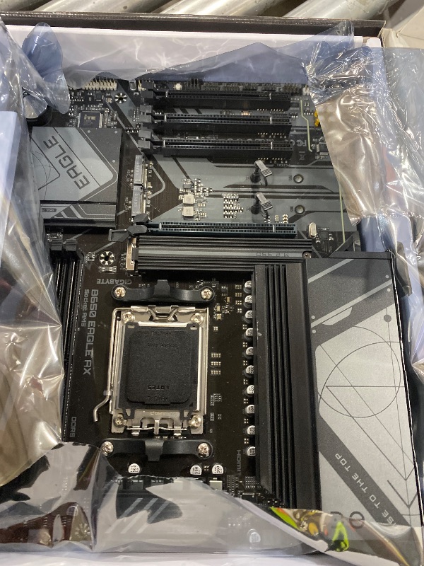 Photo 1 of GIGABYTE B650 Eagle AX AM5 LGA 1718 AMD B650 ATX Motherboard, DDR5, Triple M.2 (1x PCIe 5.0 M.2 + 2X PCIe 4.0 M.2), USB 3.2 Gen2x2 Type-C, AMD Wi-Fi 6E, Realtek GbE LAN